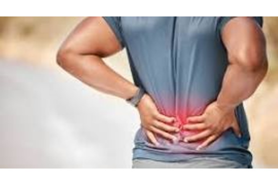 image of person holding painful back