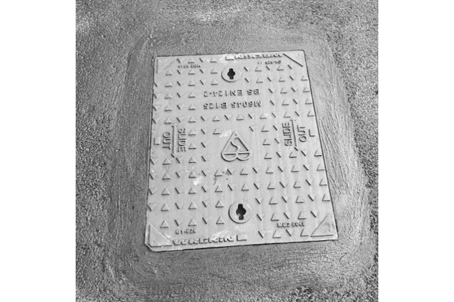 new driveway manhole cover