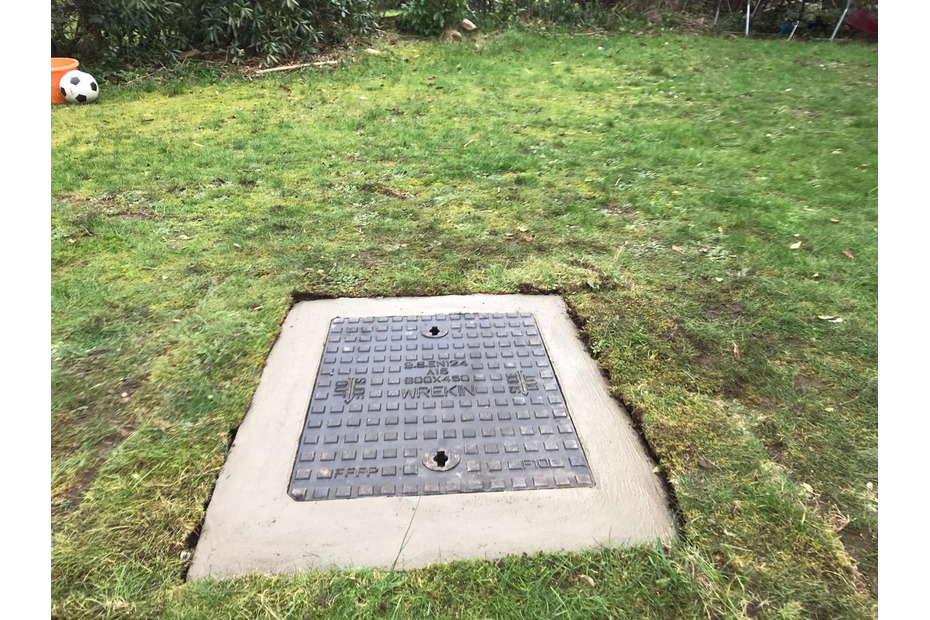 new manhole cover installed