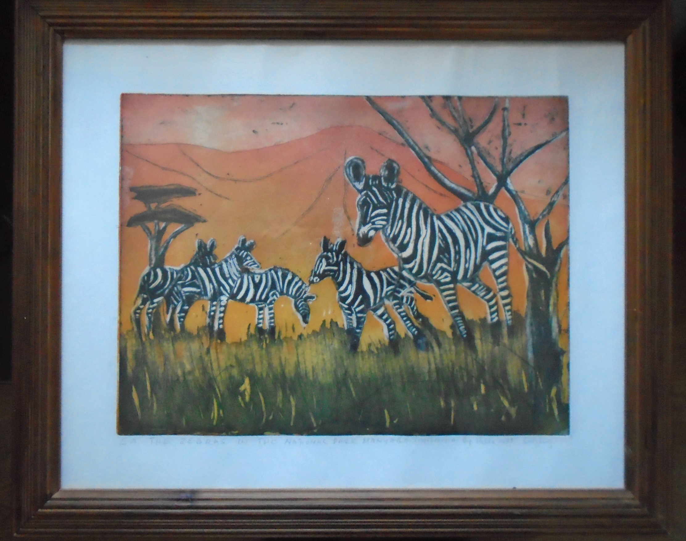 Offered for sale is a fine example of a framed  signed and dated coloured etching by Tanzanian Artist Pelle Shaibu.(b1952 )
