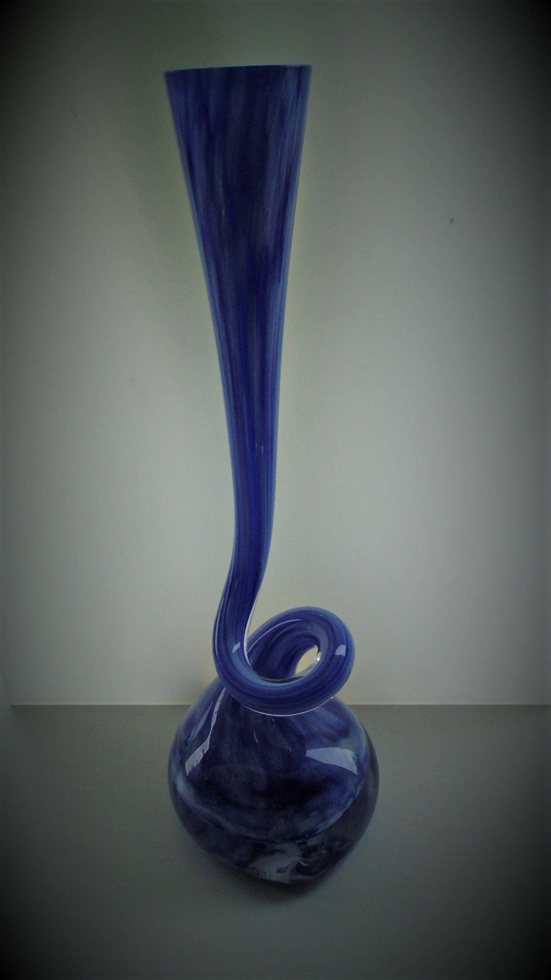 Offered for sale is what I believe to be a handmade art glass Makora Krosno style blue cork screw bud vase