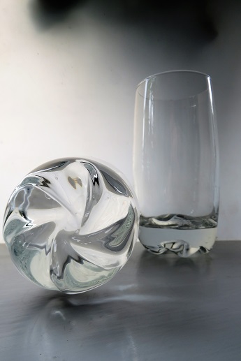 A pair of contemporary style clear glass beakers