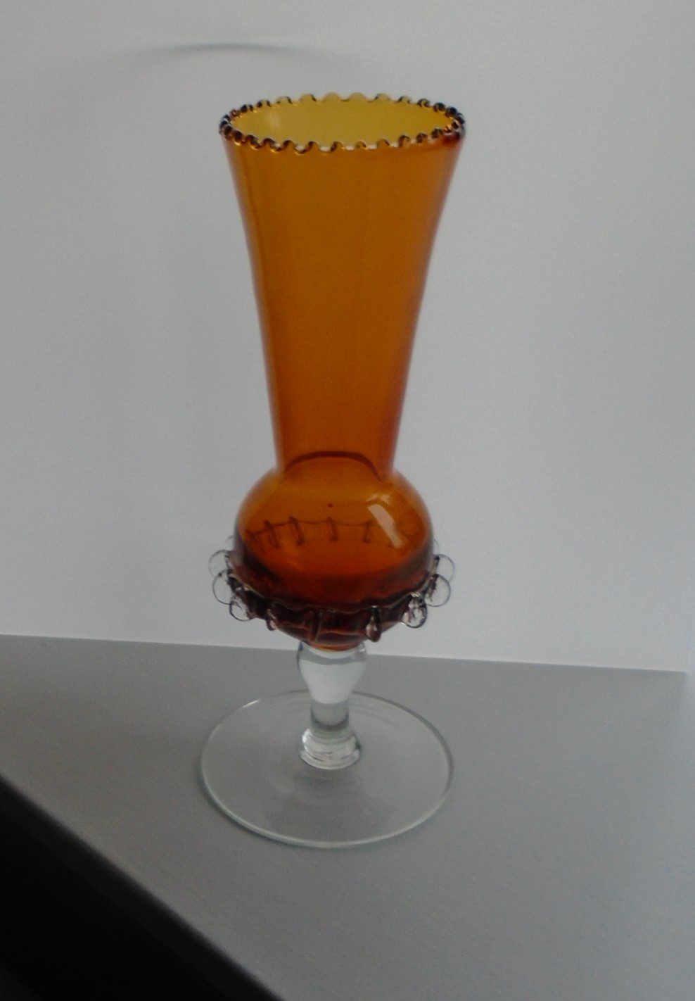 Italian Murano/Empoli Style Amber Glass Stemmed Thistle Vase with ruffled rim and trailed clear glass decoration