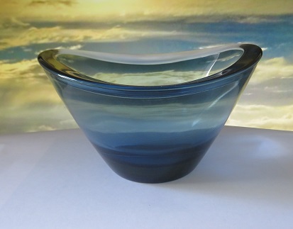 Gorgeous Stromberg style glass bowl. Formed in blue glass with an elegant swept thick glass rim.