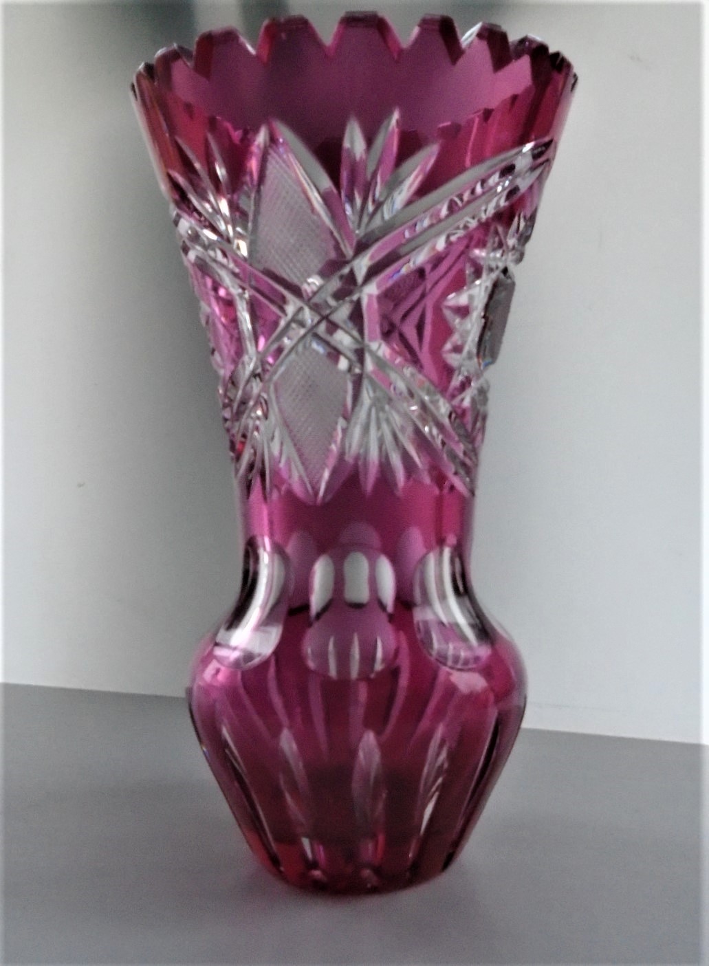 Stunning vintage Bohemian Cranberry Cut  to Clear Glass Vase