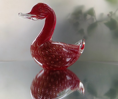 Gorgeous Murano Ruby Glass Duck figurine with controlled bubbles and gold aventurine decoration.