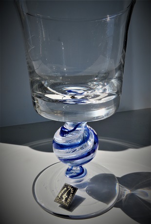 LANGHAM GLASS HOUSE GOBLET WITH A BLUE AND WHITE SPIRAL BALL STEM.