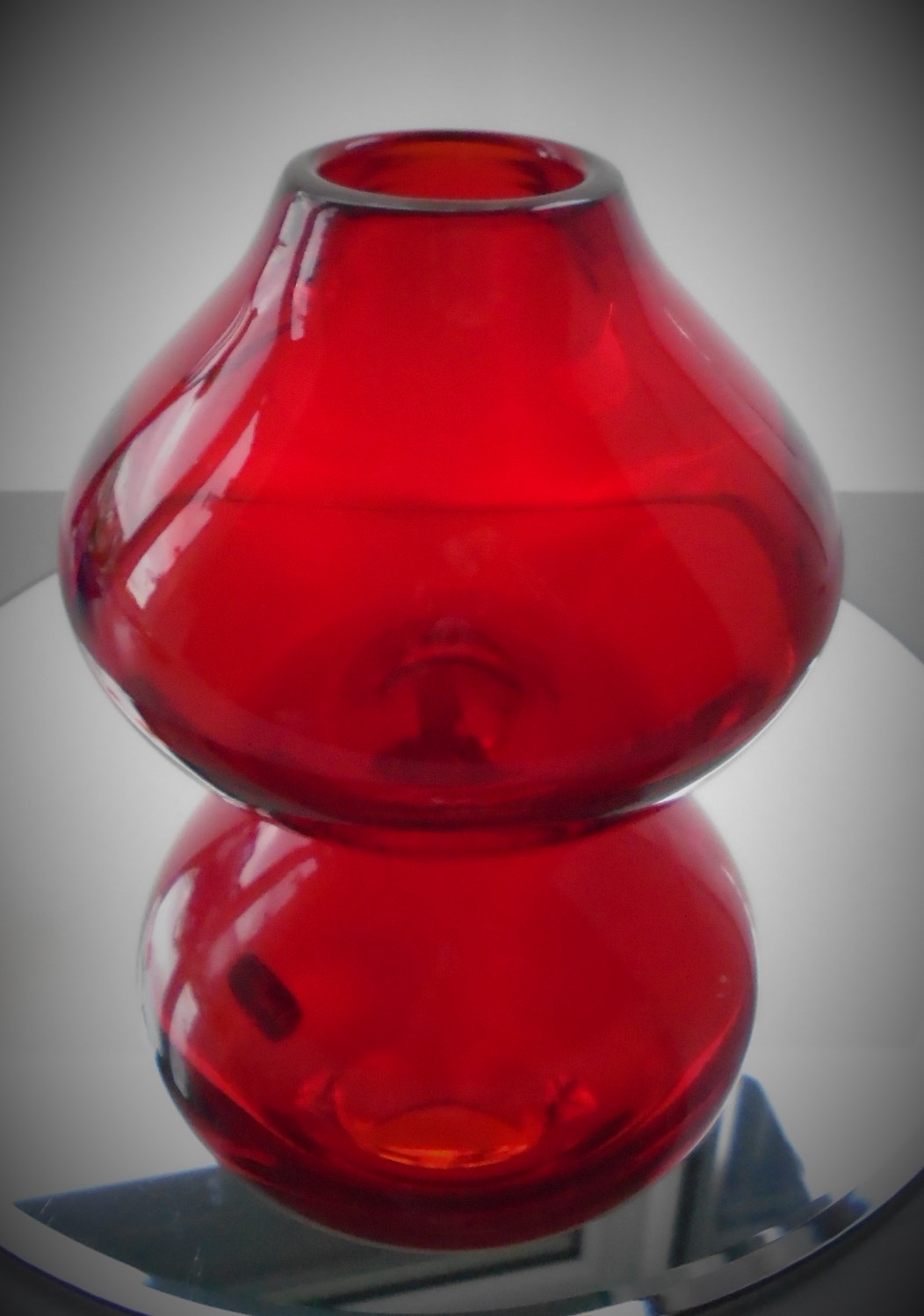 Fine example of a Whitefriars Angular Mould Blown Crystal Glass Vase by Geoffrey Baxter Pattern 9586 in Ruby
