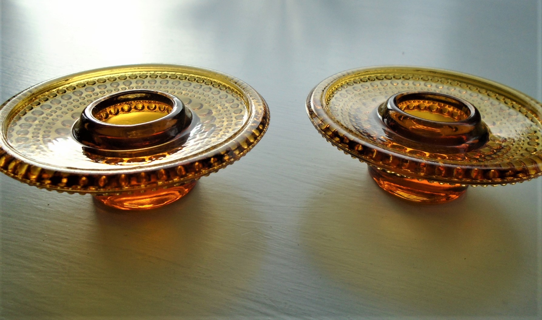  Pair of exquisite vintage amber Iittala Kastehelmi candle holders by Oiva Toikka.