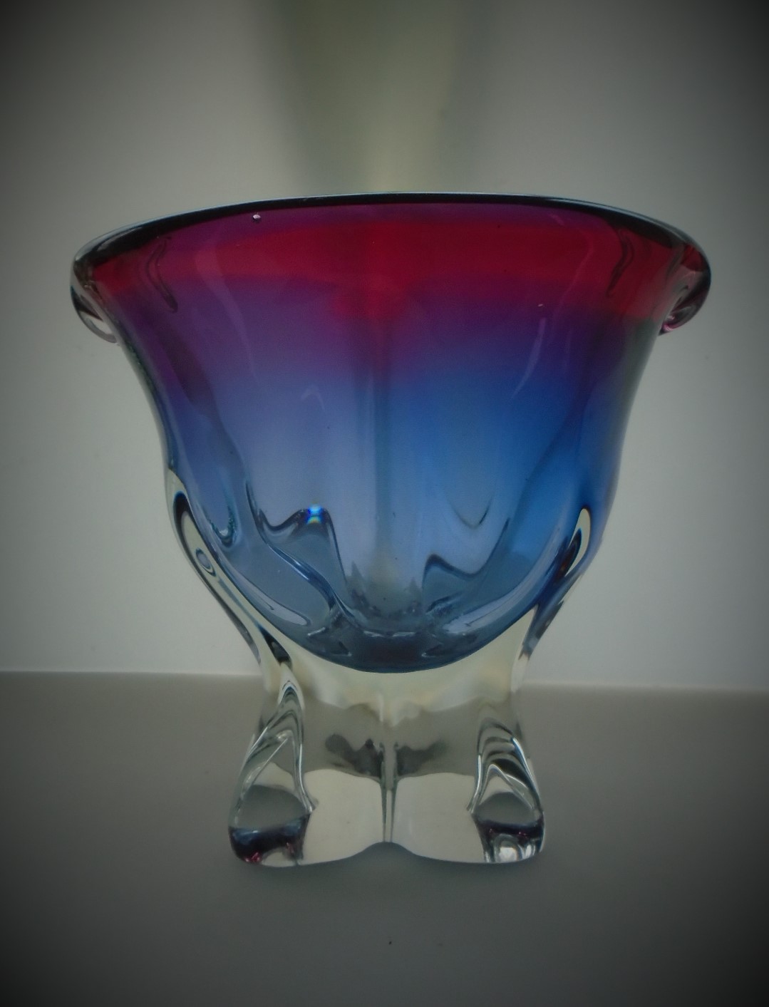 Offered for sale is what I believe to be a stunning example of Vintage Czech Glass in the form of this Chribska purple/pinky/ blue free form Vase