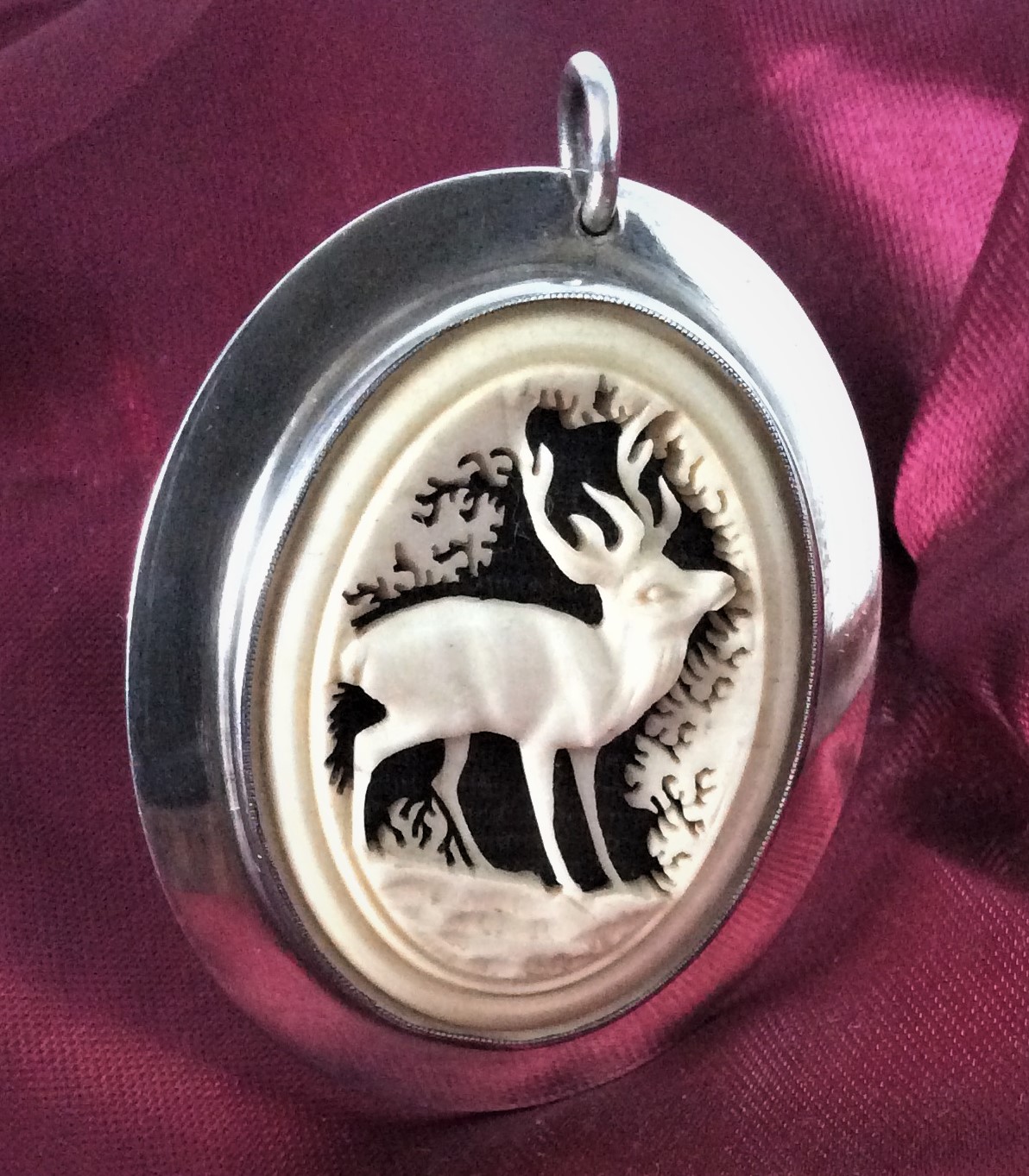  Antique Wonderful Winter Scene in Finely Carved Bovine with Stag inset. Mounted in Signed Sterling Silver Pendant Brooch weight 19g Size 4.7cm x 3.8cm 