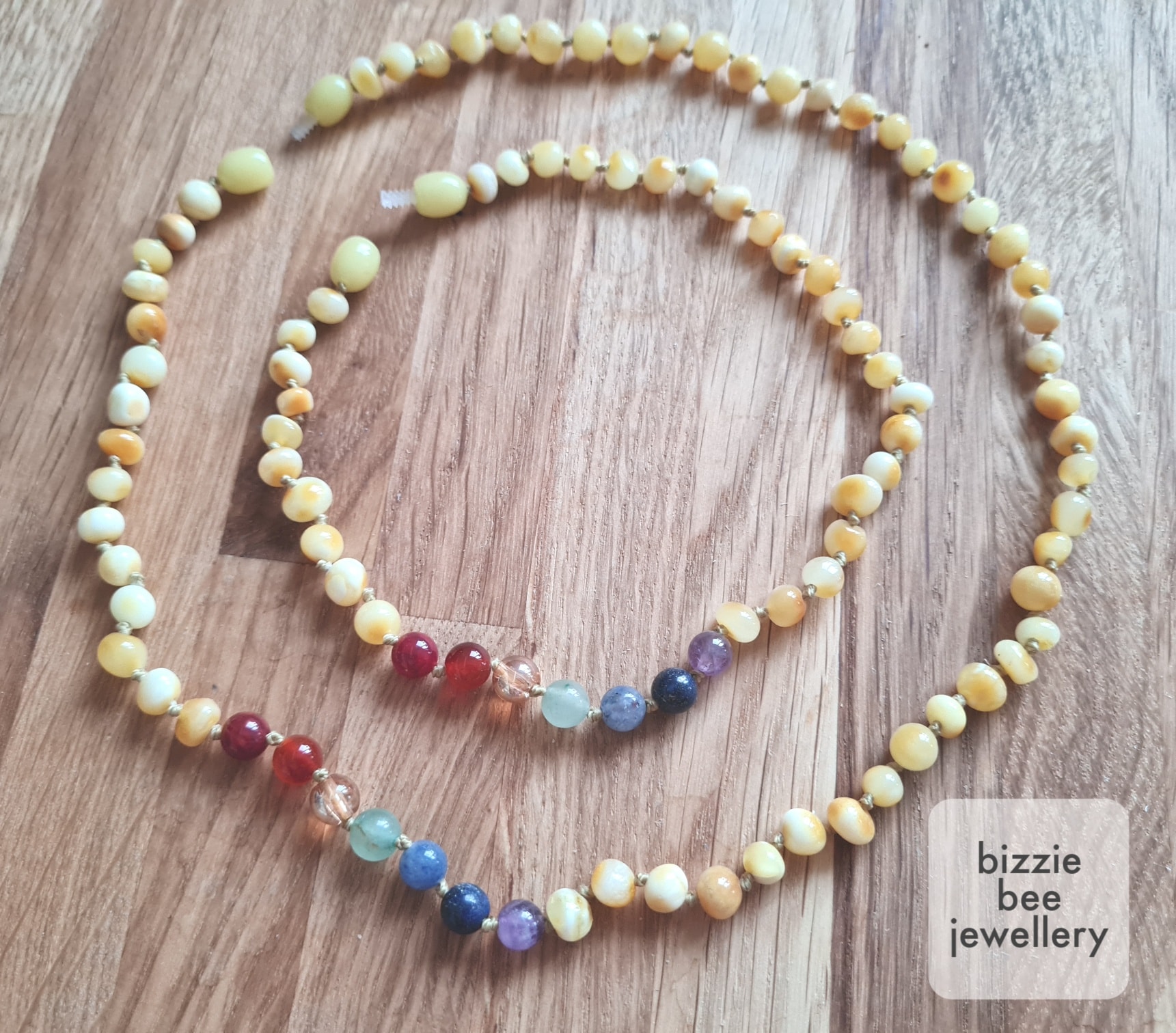 Baltic amber length with a rainbow of crystals