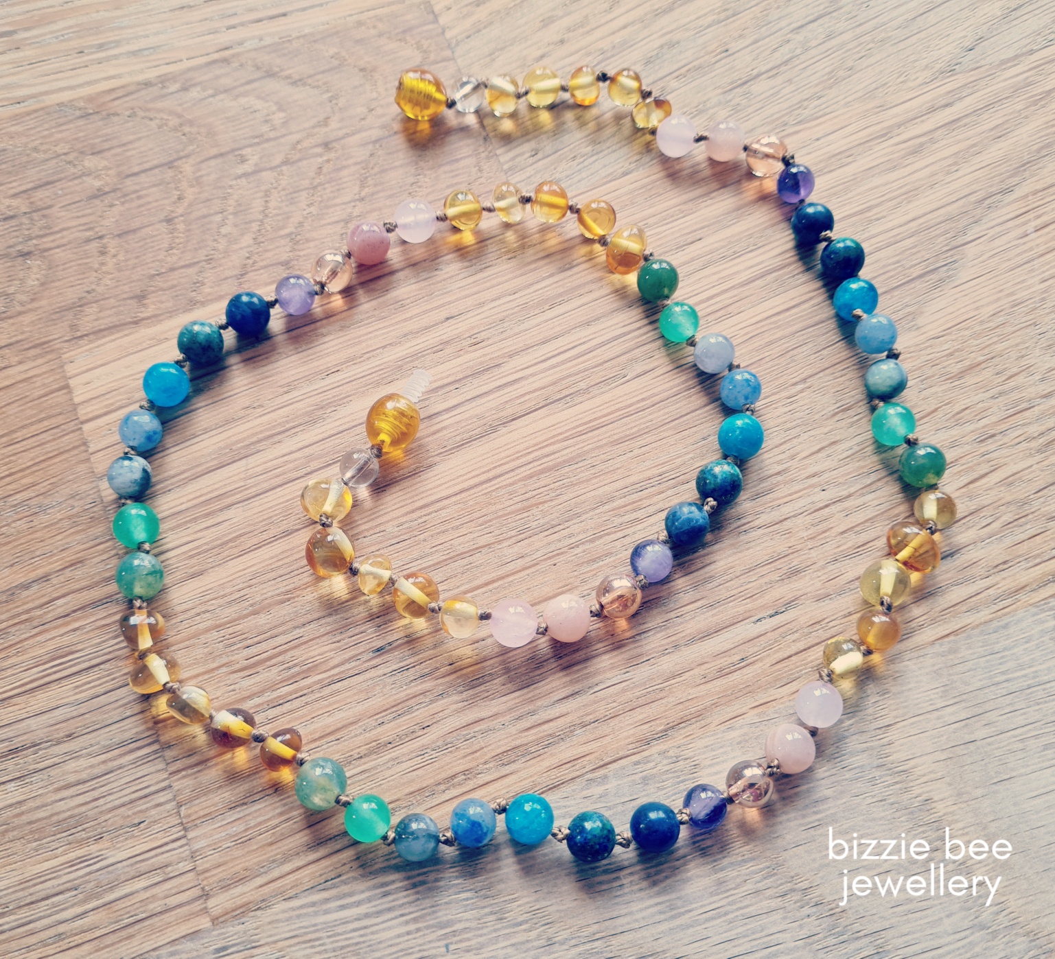 Baltic amber necklace with a rainbow of crystals