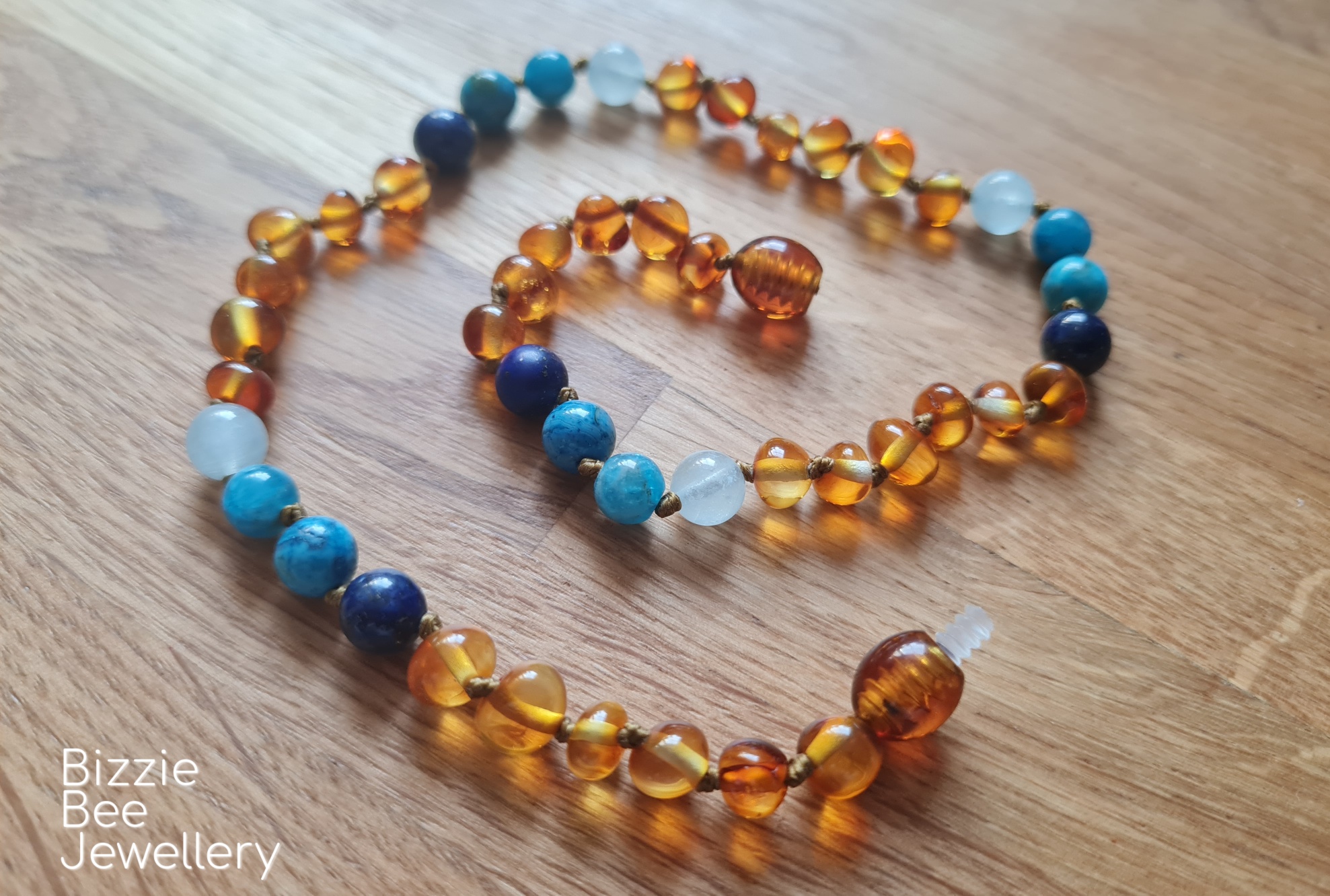 Baltic amber necklace with a rainbow of crystals