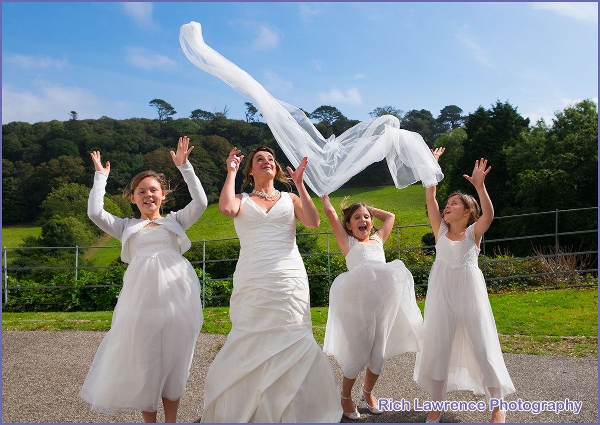 Bride loosing veil in the wind