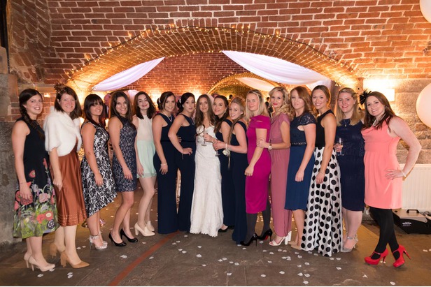 Bride poses with girls